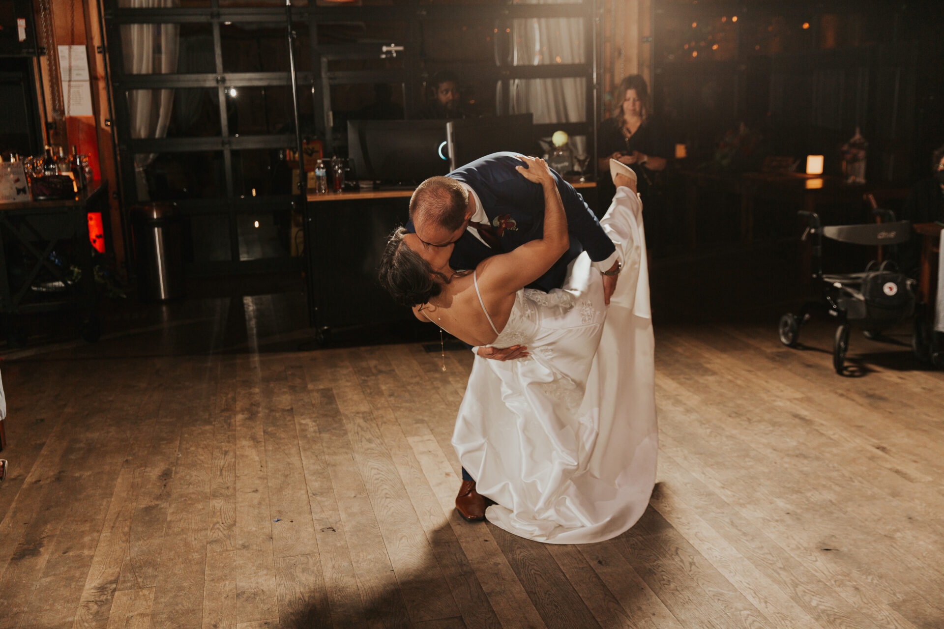 A dip kiss on the empty dance floor